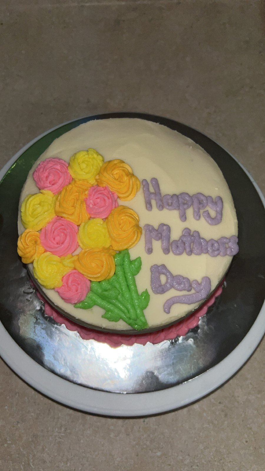 Mother's Day cake with piped flower bouquet