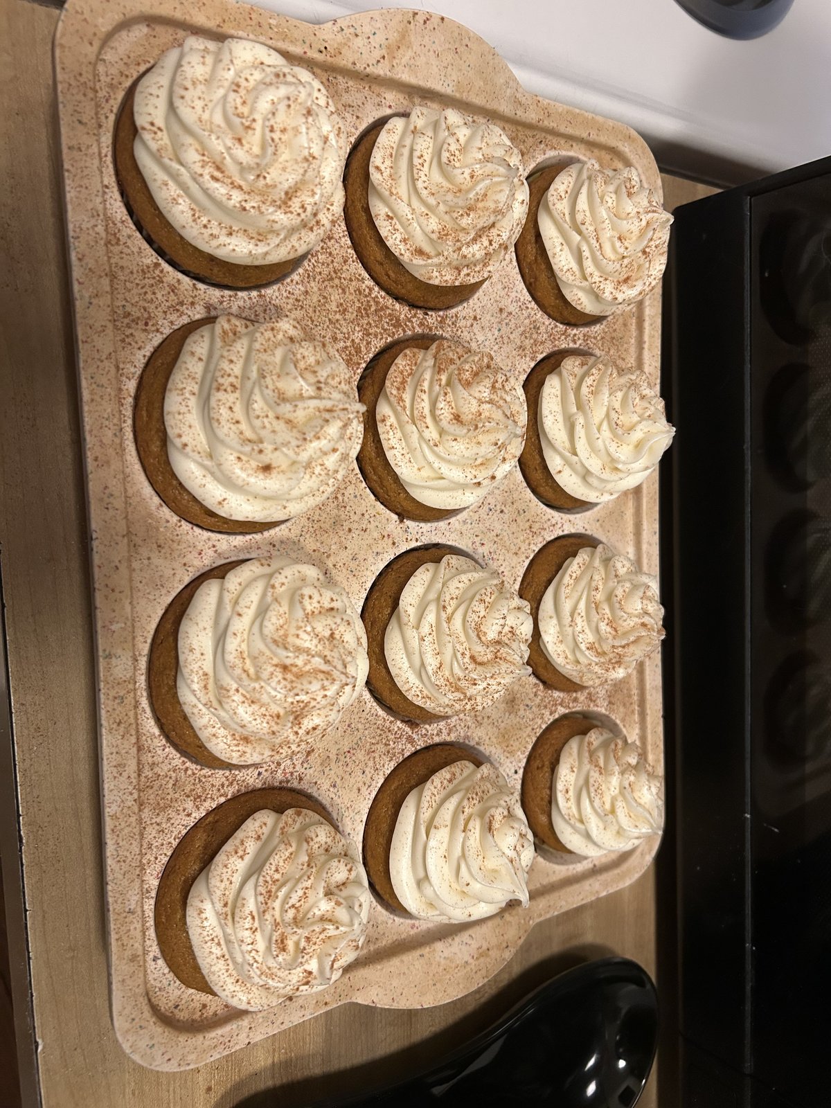 Pumpkin spice cupcakes with cream cheese frosting